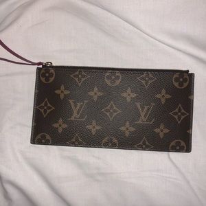 Louis Vuitton Monogram insert.